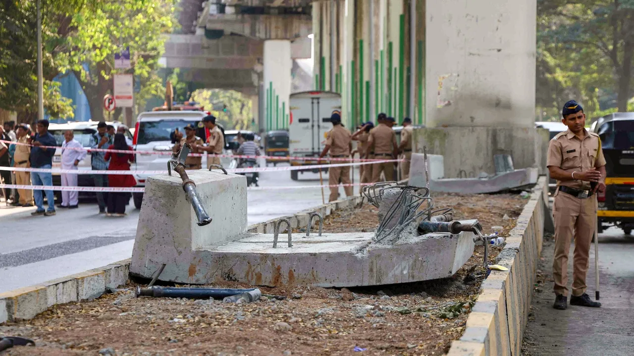 A slab of the girder bridge of under-construction metro rail line 4 collapsed on a few vehicles at Mulund area, in Mumbai, Maharashtra, Saturday, Feb. 14, 2026.