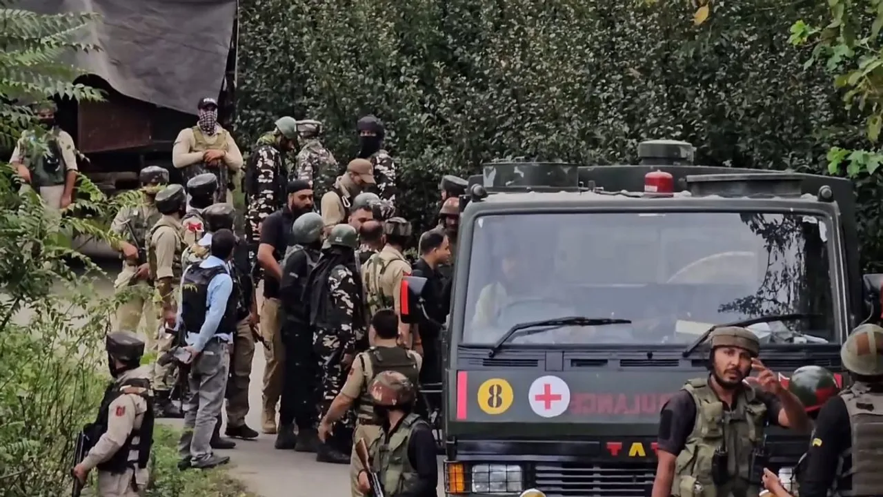 Security personnel during an encounter with militants at Chak Tapper Kreeri Pattan area, in Baramulla district, Jammu and Kashmir, Saturday, Sept. 14, 2024