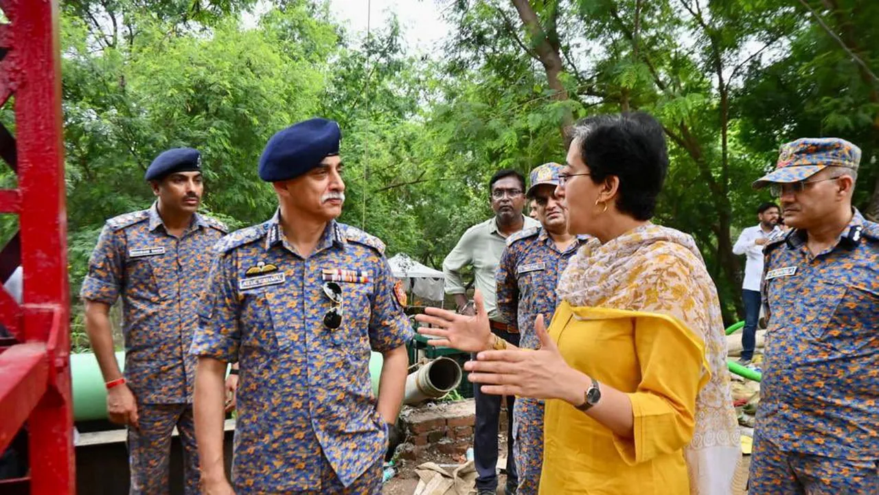 Delhi Minister Atishi Singh inspects the broken barrage and improvement work of 12 number drain at Vikas Bhawan, ITO in New Delhi