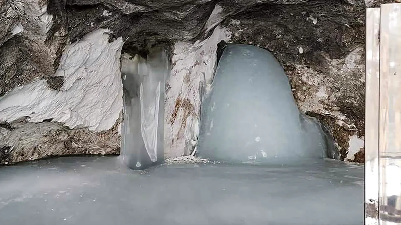 Naturally formed Shiv Lingam (ice-lingam) in the holy cave shrine of Amarnath, the abode of Lord Shiva, J & K