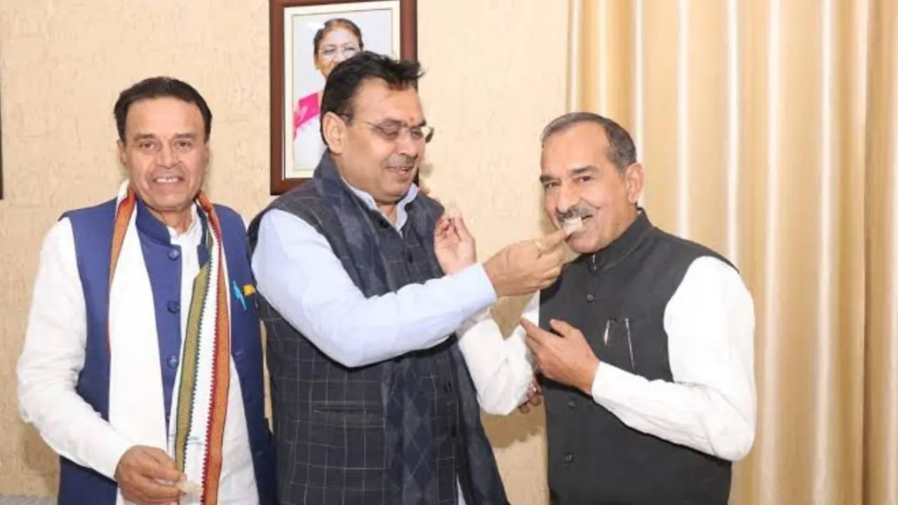 Madan Rathore with Bhajanlal Sharma (File image)