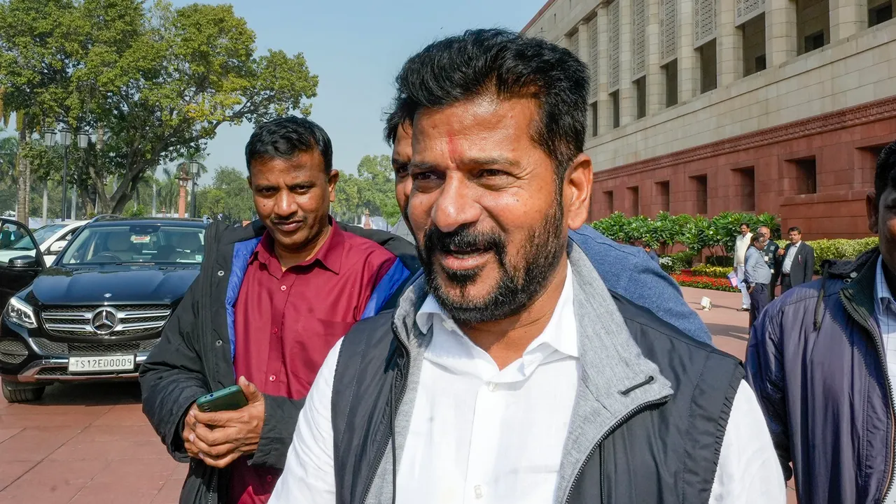 Telangana CM-designate A Revanth Reddy arrives at Parliament during the Winter session