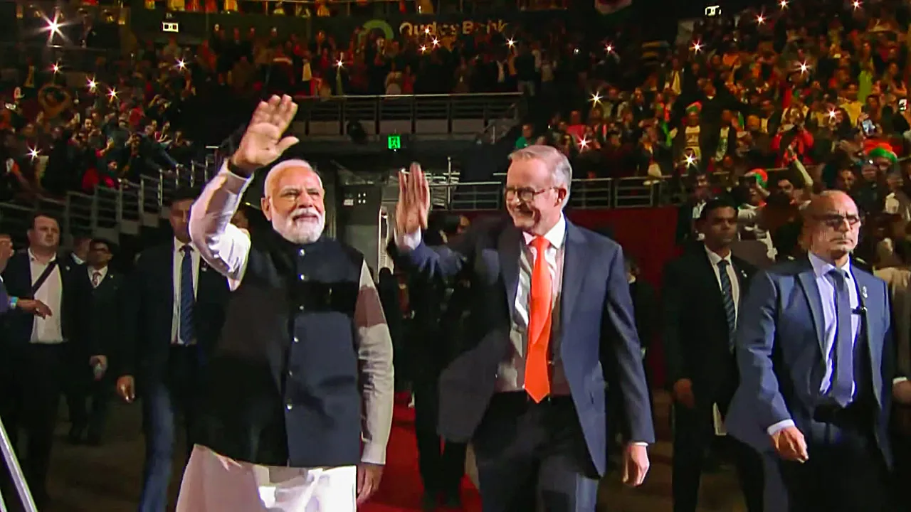 Prime Minister Narendra Modi with his Australian counterpart Anthony Albanese arrives to attend an Indian community programme, in Sydney