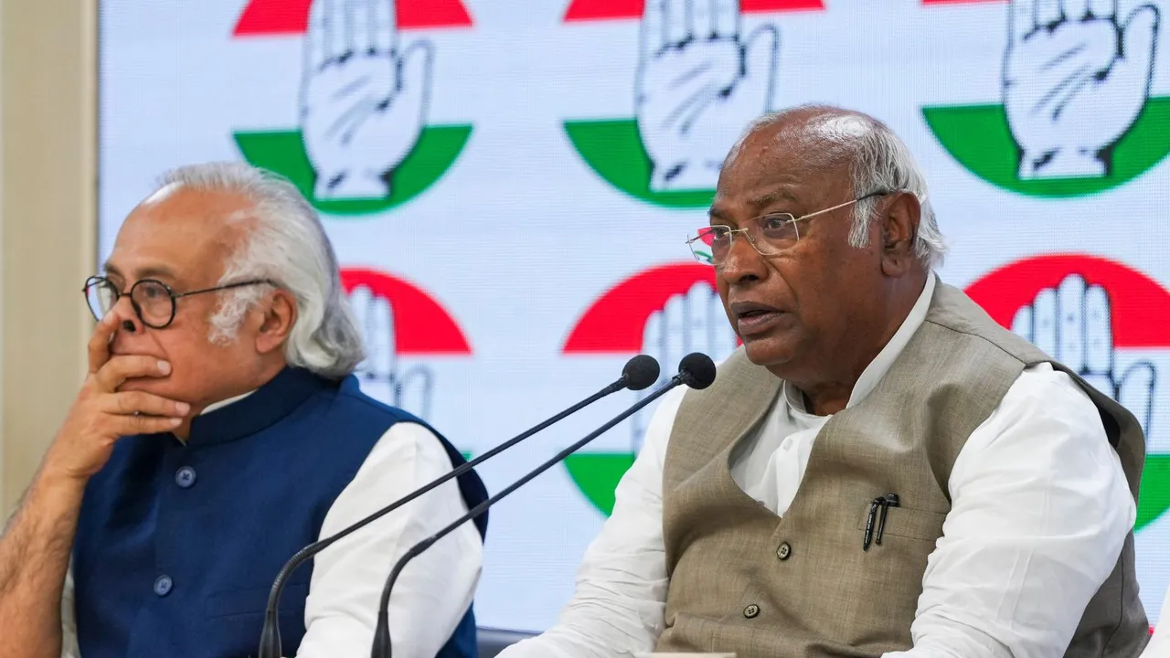 Congress President Mallikarjun Kharge along with party leader Jairam Ramesh addresses a press conference at AICC headquarter, in New Delhi, Thursday, May 30, 2024