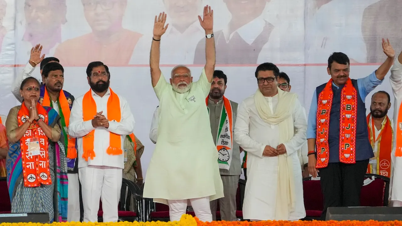 Prime Minister Narendra Modi with Maharashtra Navnirman Sena (MNS) chief Raj Thackeray during a rally for Lok Sabha elections, in Mumbai, Friday, May 17, 2024.