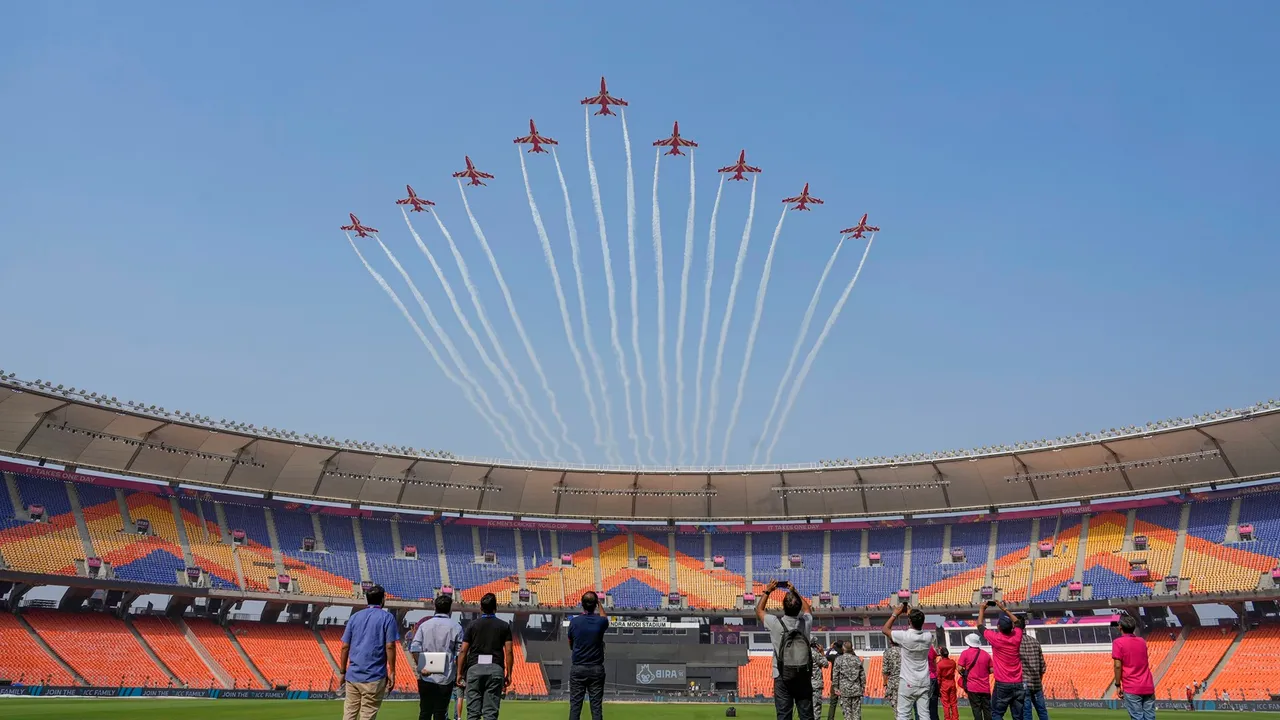 IAF's Surya Kiran Team flies past during rehearsal ahead of the ICC Men’s Cricket World Cup 2023’s final match between India and Australia, at the Narendra Modi Stadium, in Ahmedabad