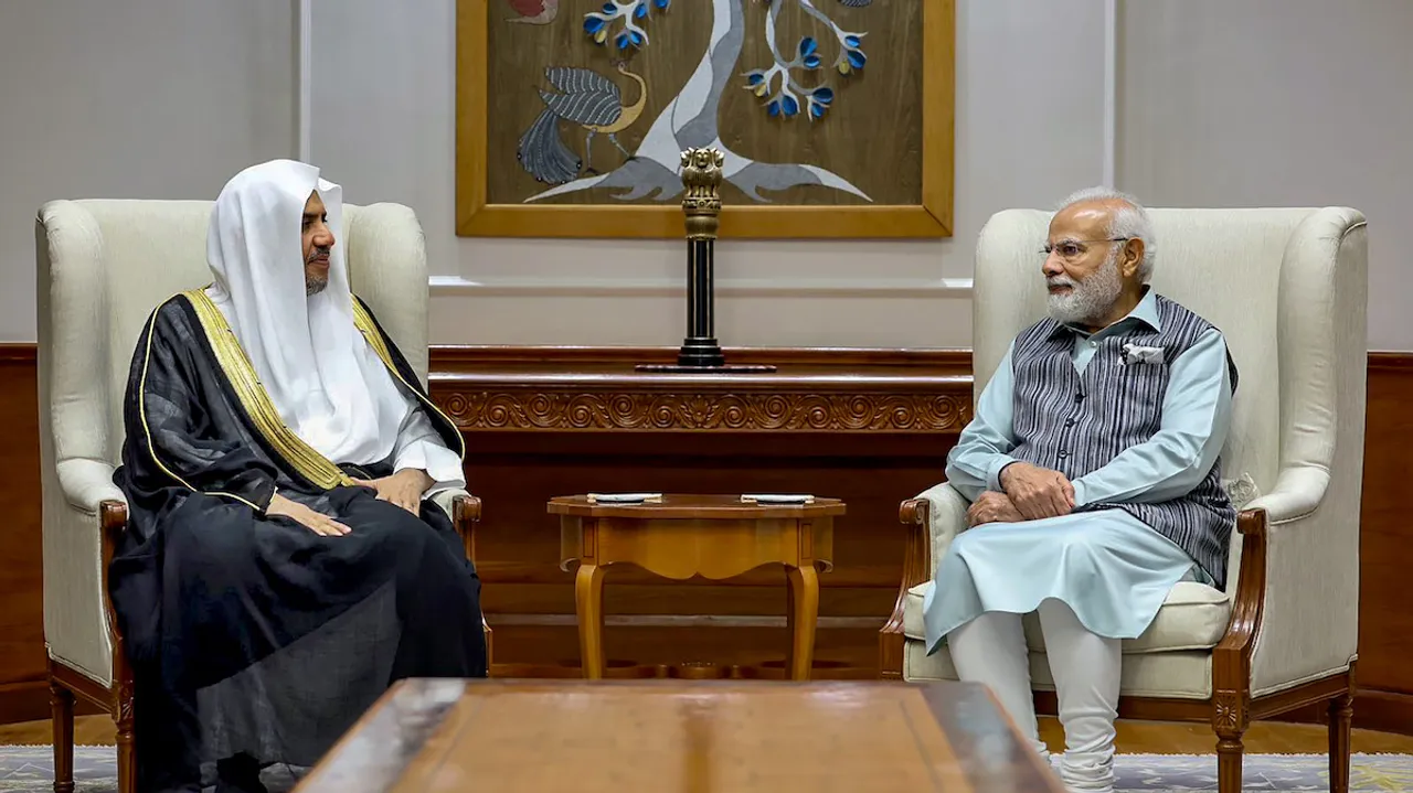 Prime Minister Narendra Modi with Secretary General of the Muslim World League Mohammad bin Abdulkarim al-Issa during a meeting, in New Delhi, Tuesday, July 11,