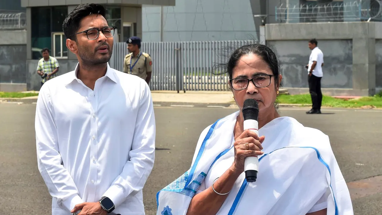 West Bengal Chief Minister and TMC chief Mamata Banerjee with the party's National General Secretary Abhishek Banerjee addresses the media at the Netaji Subhash Chandra Bose International Airport before leaving for Delhi, in Kolkata, Friday, July 26, 2024.