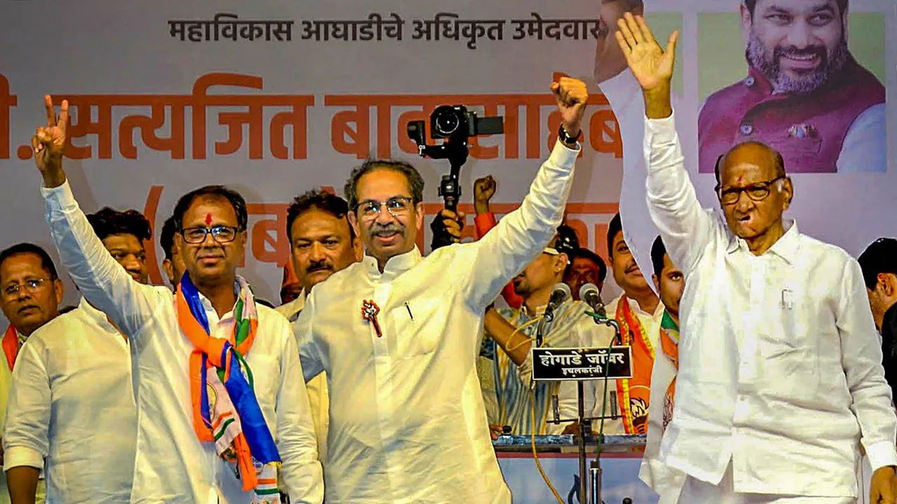 Shiv Sena (UBT) chief Uddhav Thackeray and NCP (SP) President Sharad Pawar during a public meeting for Lok Sabha polls, in Kolhapur, Wednesday, May 1, 2024