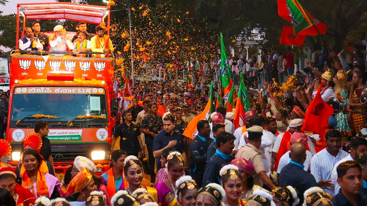 Prime Minister Narendra Modi during a roadshow ahead of the Karnataka Assembly elections in Mysuru on April 30