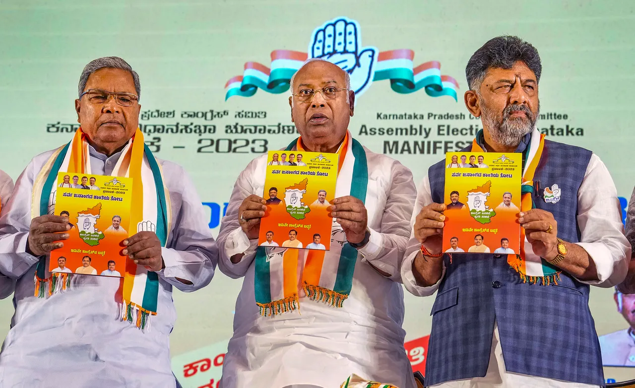 Congress President Mallikarjun Kharge with Karnataka Congress President DK Shivakumar and senior party leader Siddaramaiah releases the party's manifesto for the upcoming Karnataka Assembly elections
