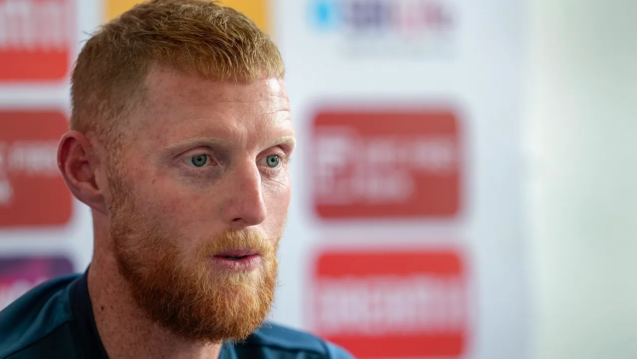 England's Ben Stokes interacts with the media, in Rajkot