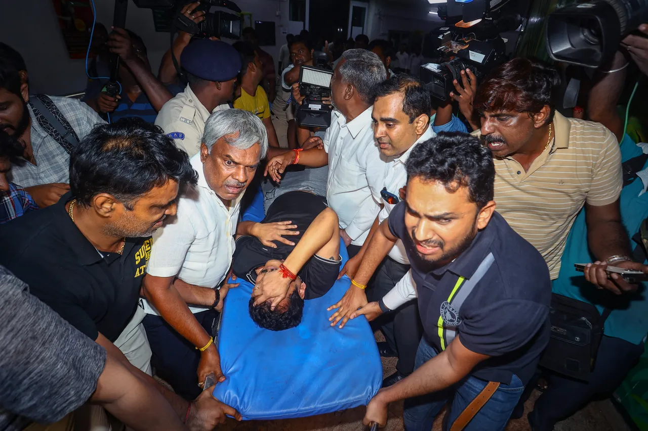 Tamil Nadu Electricity Minister V Senthil Balaji reacts in pain while being taken to a government hospital after his arrest in connection with a money laundering case, in Chennai