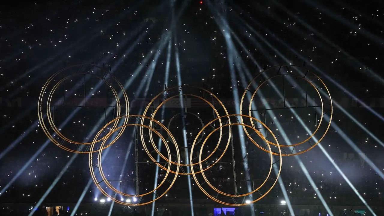 Lights illuminate the Olympic rings during a performance at the closing ceremony of the 2024 Summer Olympics at the Stade de France, in Paris, France, Sunday, Aug. 11, 2024.