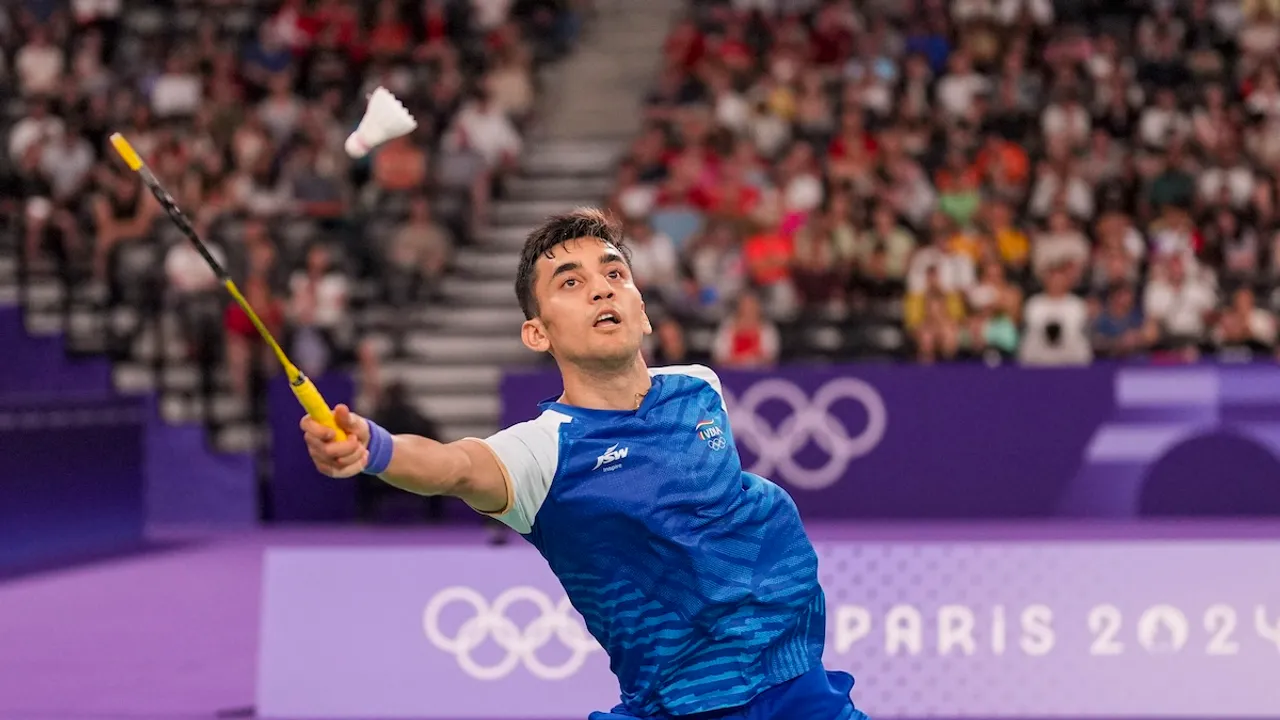 Lakshya Sen plays a shot during the men's badminton singles quarterfinal match against Chinese Taipei's Chou Tien Chen at the 2024 Summer Olympics, in Paris, France, Friday, Aug. 2, 2024.