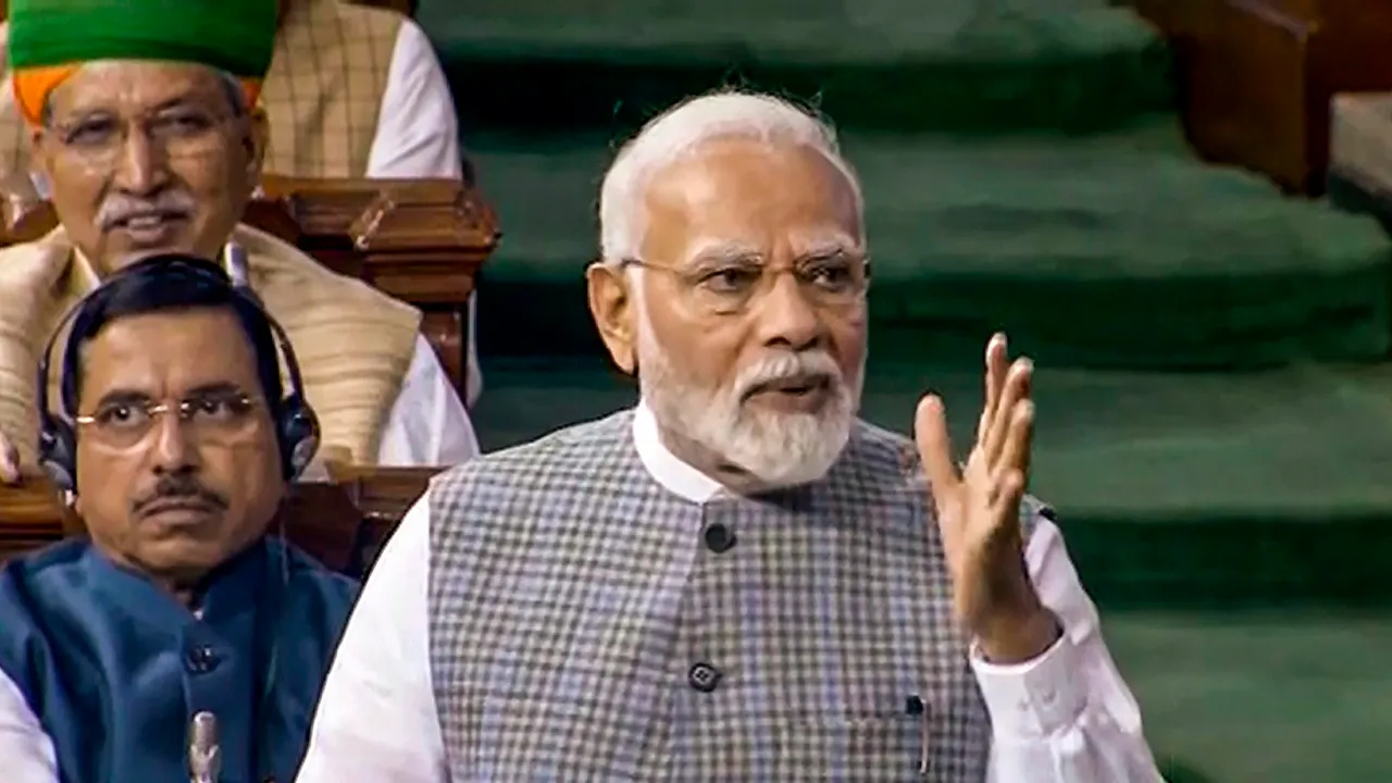 Prime Minister Narendra Modi speaks in the Lok Sabha during a special session of Parliament, in New Delhi