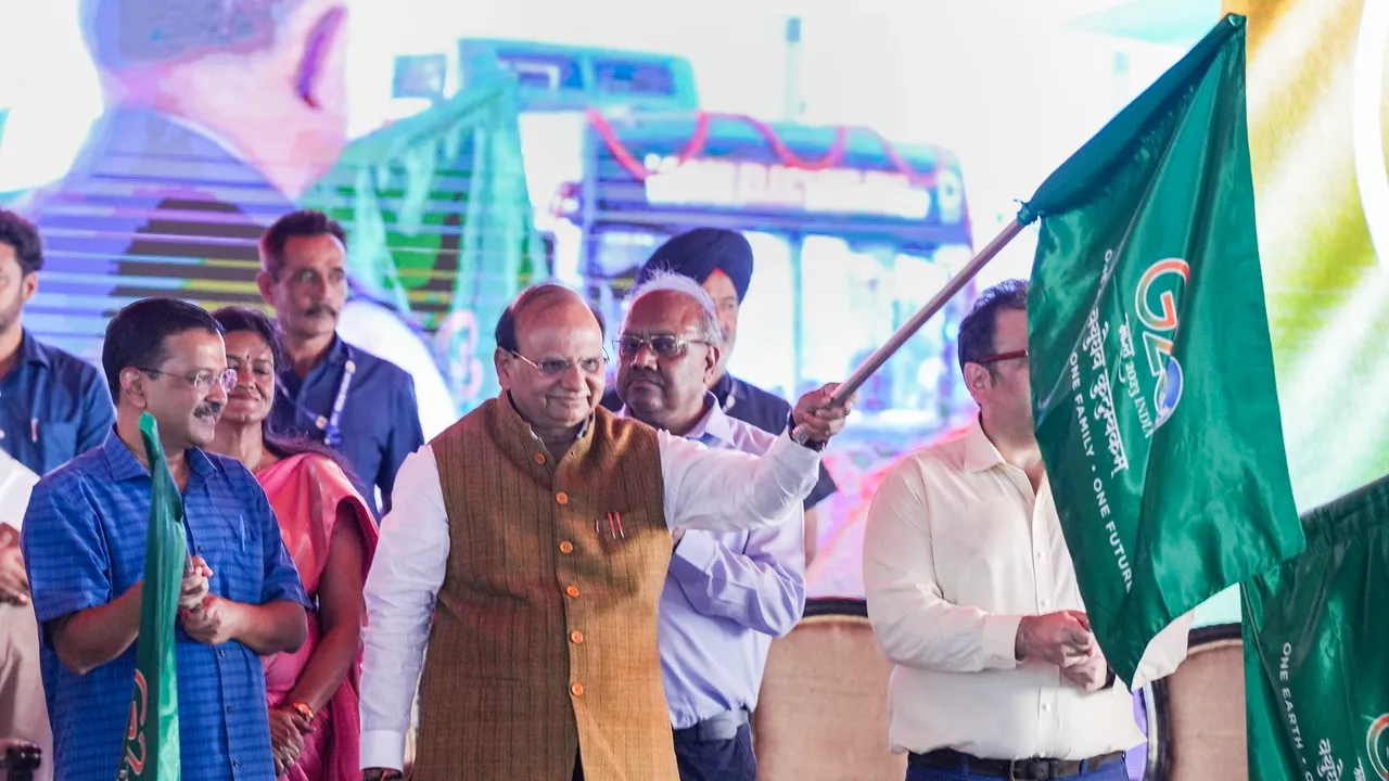Delhi Lt. Governor VK Saxena and Chief Minister Arvind Kejriwal flag off 400 new electric buses during a ceremony at IP Depot, in New Delhi