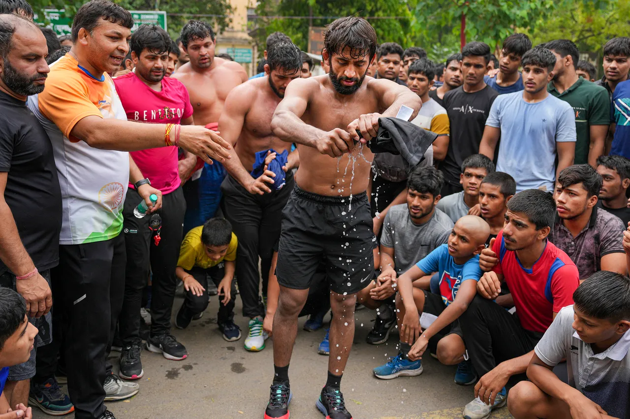 Wrestler Bajrang Punia exercises at Jantar Mantar during wrestlers' protest, in New Delhi