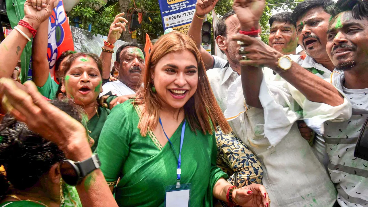 TMC supporters celebrate with Shreya Pandey, daughter of party candidate Supti Pandey, as she leads from Maniktala constituency during counting of votes for Assembly by-election, in Kolkata, Saturday, July 13, 2024.