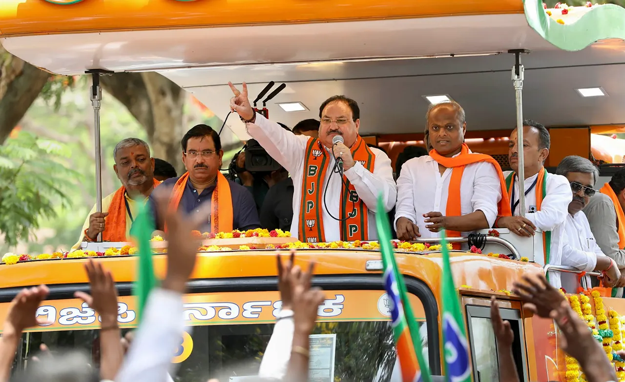 BJP National President JP Nadda with senior leader Pralhad Joshi and others during an election campaign roadshow in Kalaghatagi, Dharwad