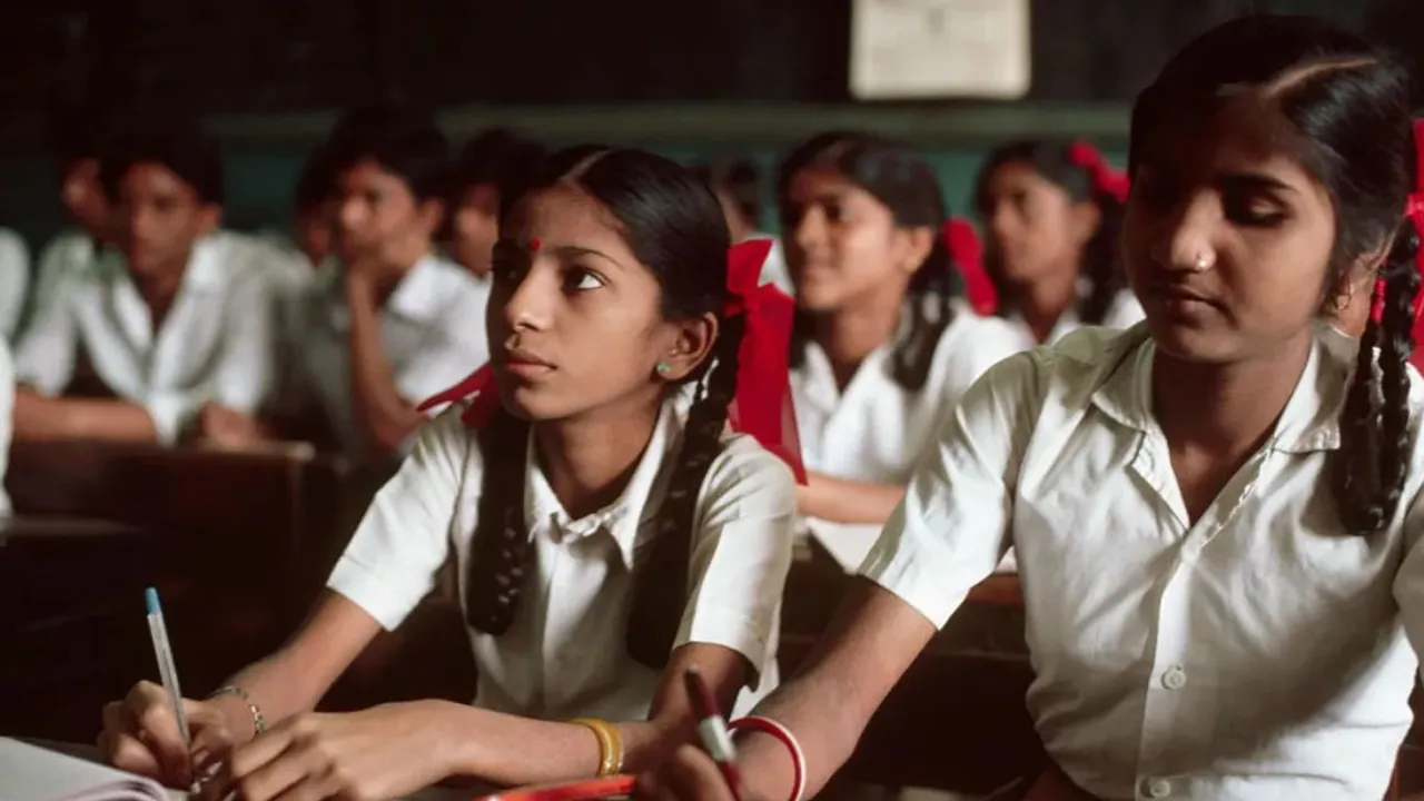 girls studying in school education educating girl child