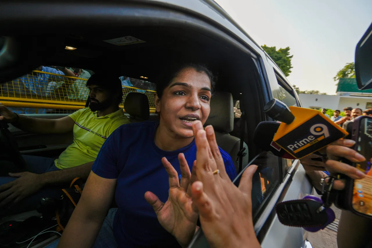 Wrestler Sakshi Malik leaves from the residence of Union Minister for Youth Affairs & Sports Anurag Thakur after a meeting, in New Delhi