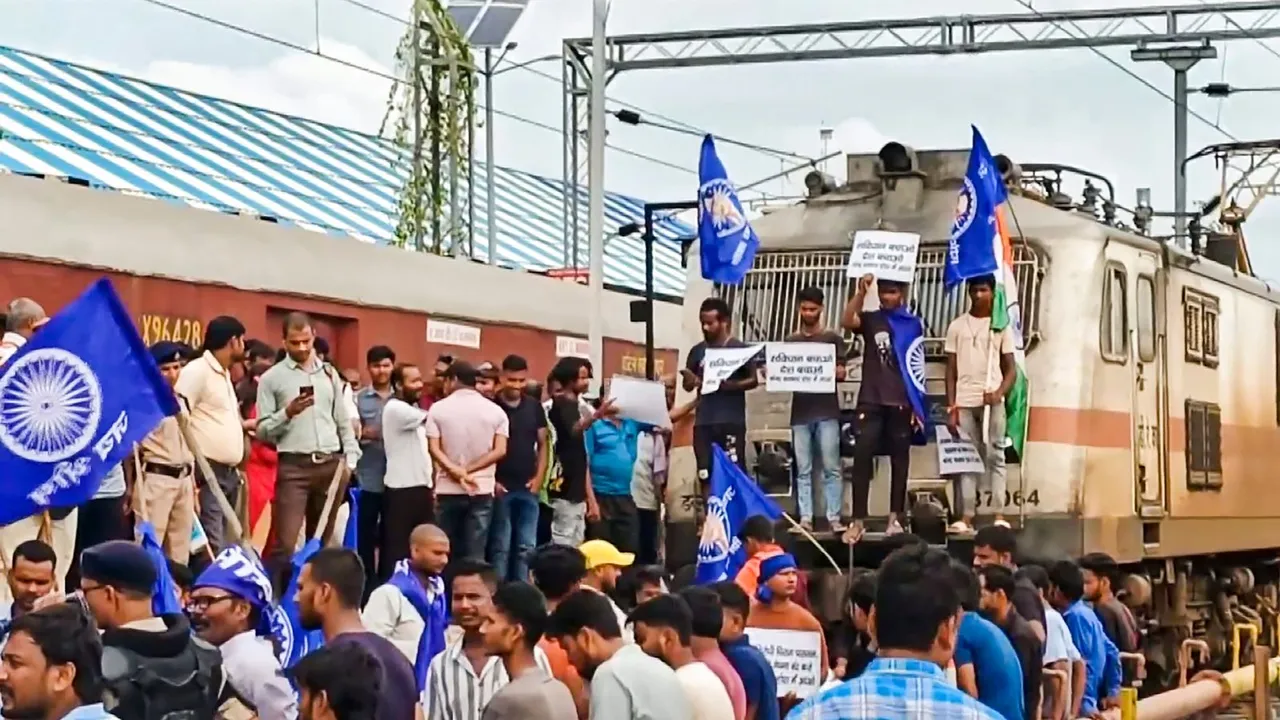 Bhim Army supporters block railway tracks in support of the Bharat Bandh call over the recent Supreme Court ruling on SC/ST reservations, in Darbhanga, Thursday, Aug. 21, 2024.