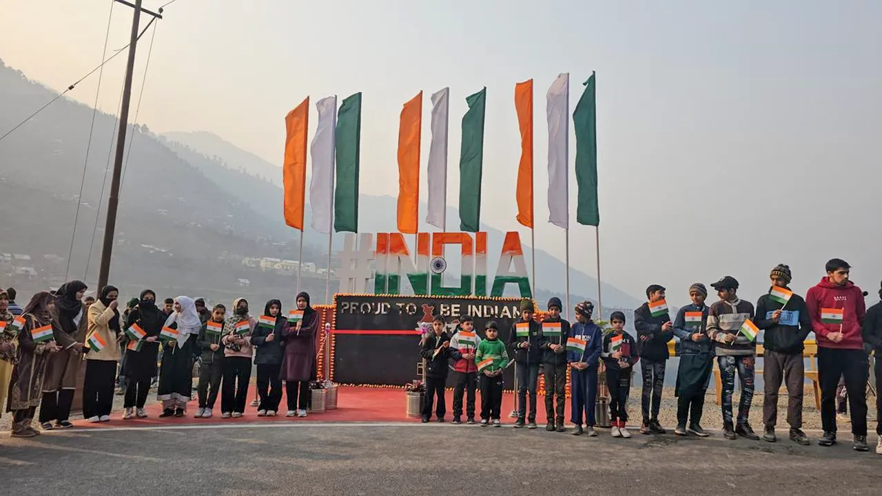 People stand at the the INDIA selfie point near the Line of Control (LoC) at Uri, in Baramulla district