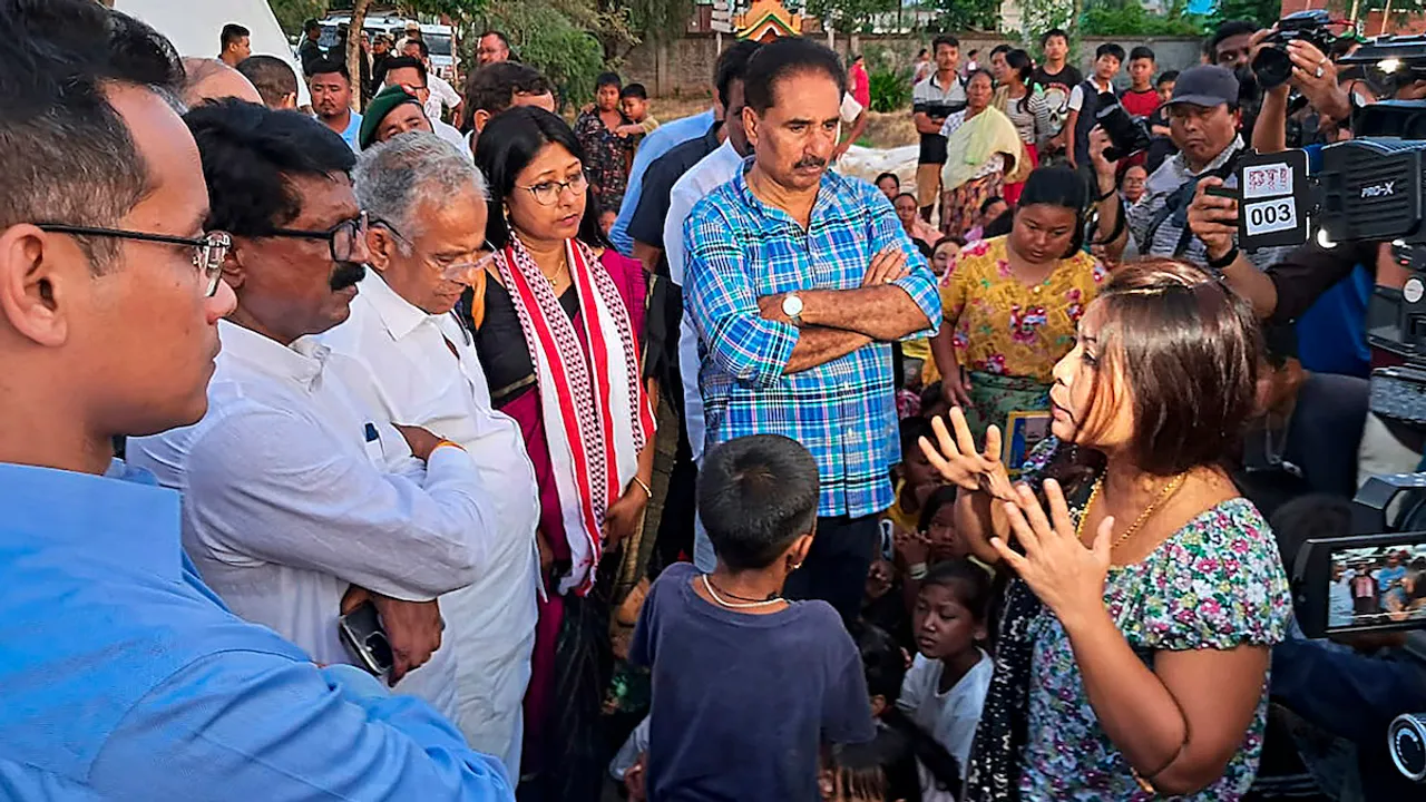 Congress MP Gaurav Gogoi, JMM MP Mahua Maji, former Manipur chief minister Okram Ibobi Singh and other leaders of the INDIA alliance parties meet people affected by the ethnic violence in Manipur, at a relief camp in Imphal East district, Saturday, July 29