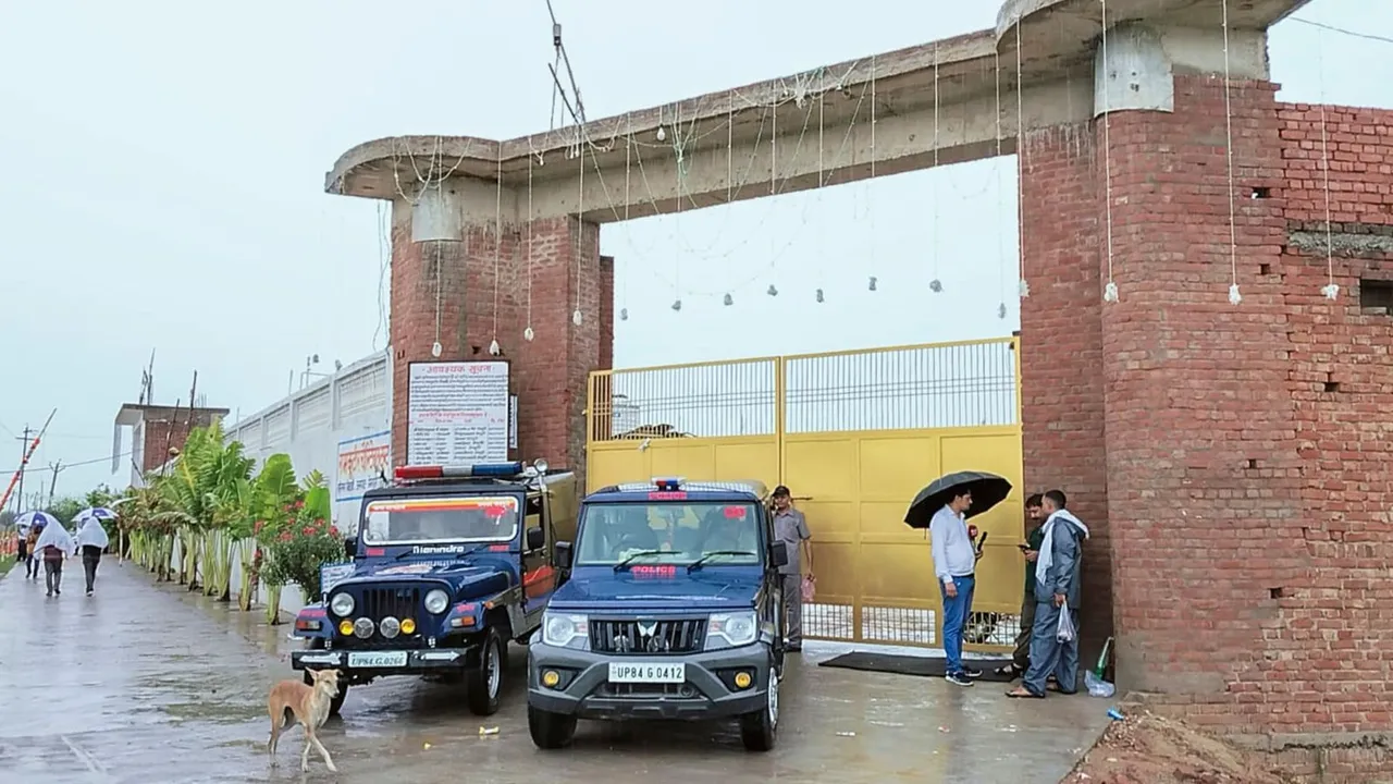Police personnel outside the Bhole Baba's Ashram, in Bichhwa of Mainpuri district, Wednesday, July 3, 2024.