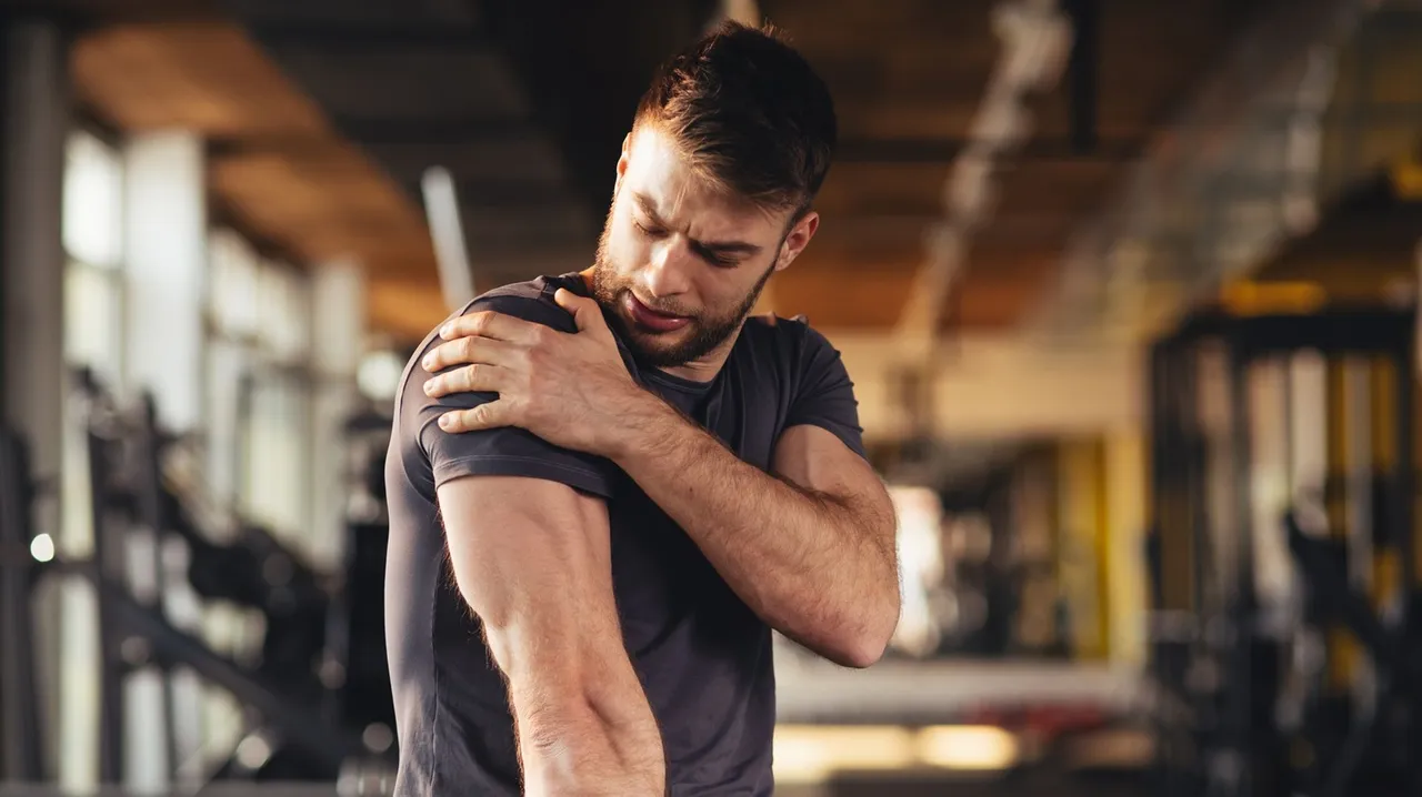 man muscles sore after exercise
