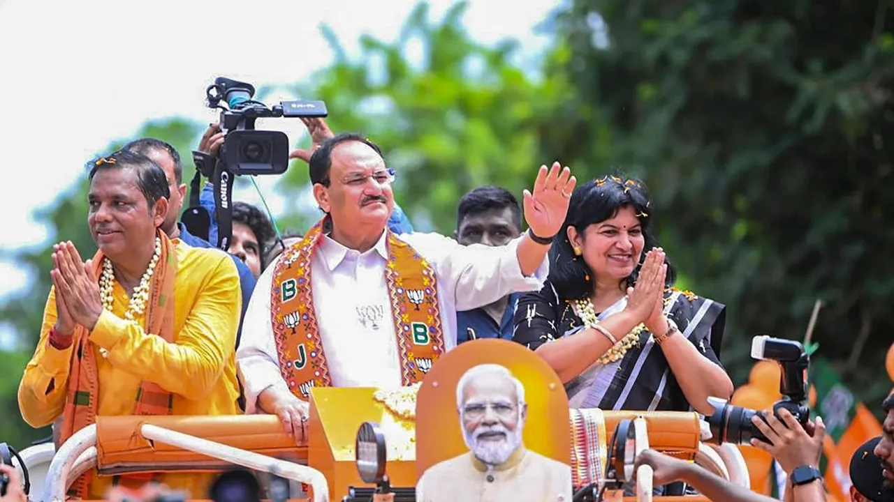 BJP National President J P Nadda and party candidate and MP Aparajita Sarangi during a roadshow for Lok Sabha elections, in Bhubaneshwar, Thursday, May 16, 2024