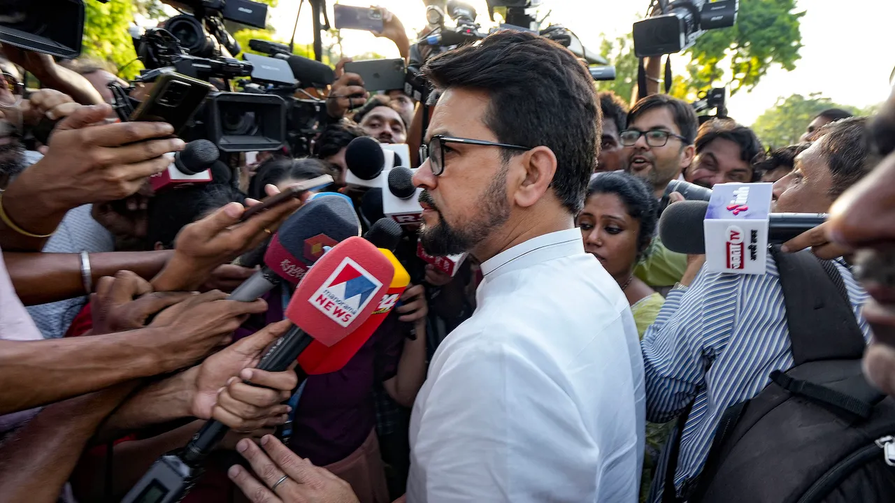 Union Minister for Youth Affairs and Sports Anurag Thakur speaks with the media after a meeting with wrestlers on June 7