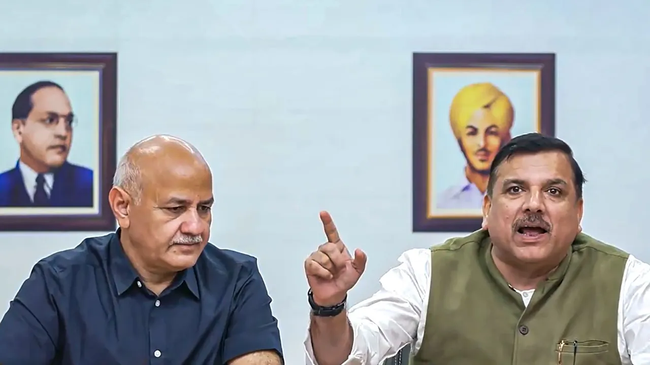AAP leaders Manish Sisodia and Sanjay Singh address a press conference after the Supreme Court granted bail to party convenor and Delhi CM Arvind Kejriwal in the excise policy corruption case, in New Delhi, Friday, Sept. 13, 2024.