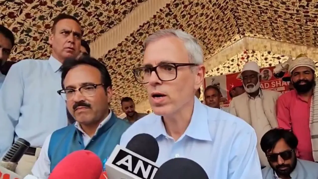National Conference leader Omar Abdullah talking to reporters