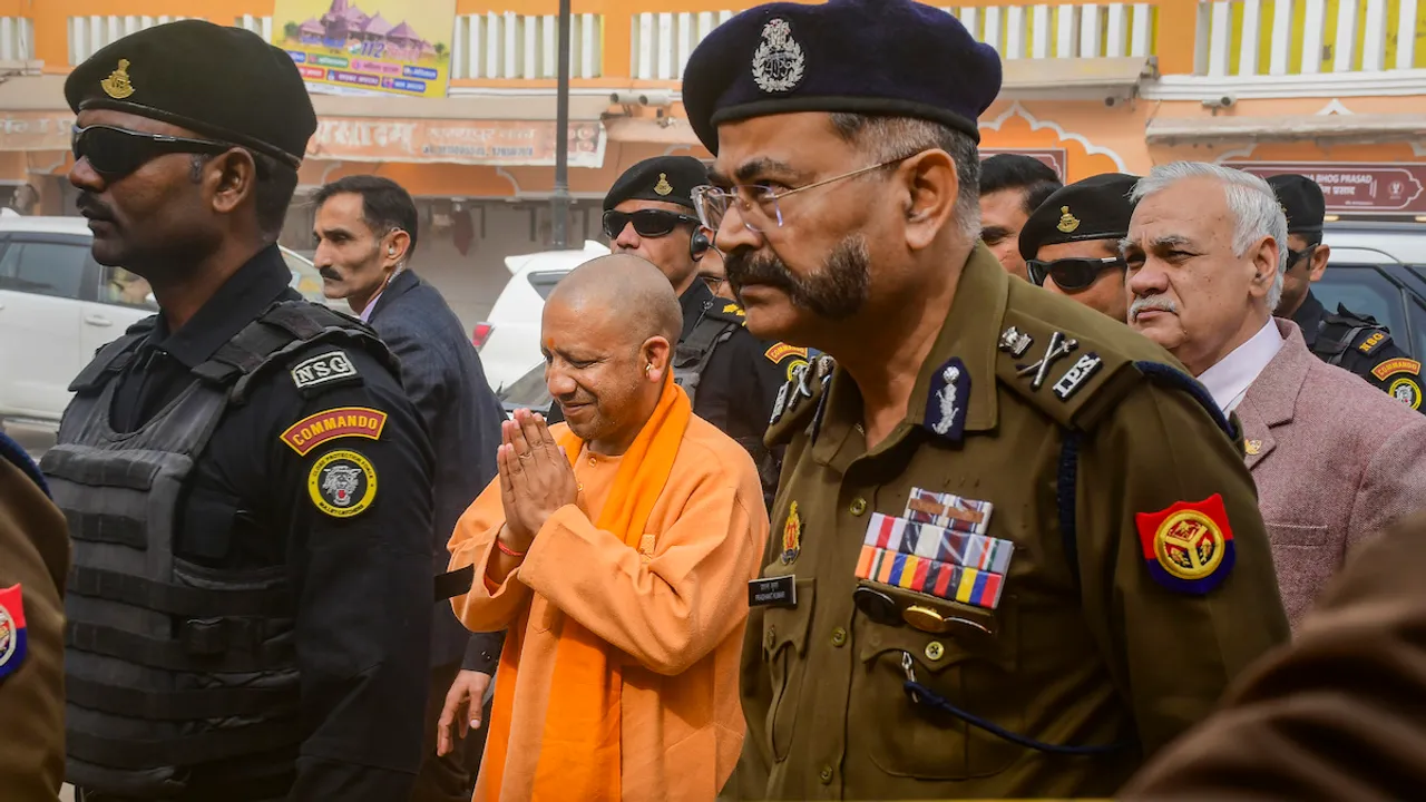Yogi Adityanath visits Hanumangari Temple, in Ayodhya, Tuesday, Jan. 9, 2024.
