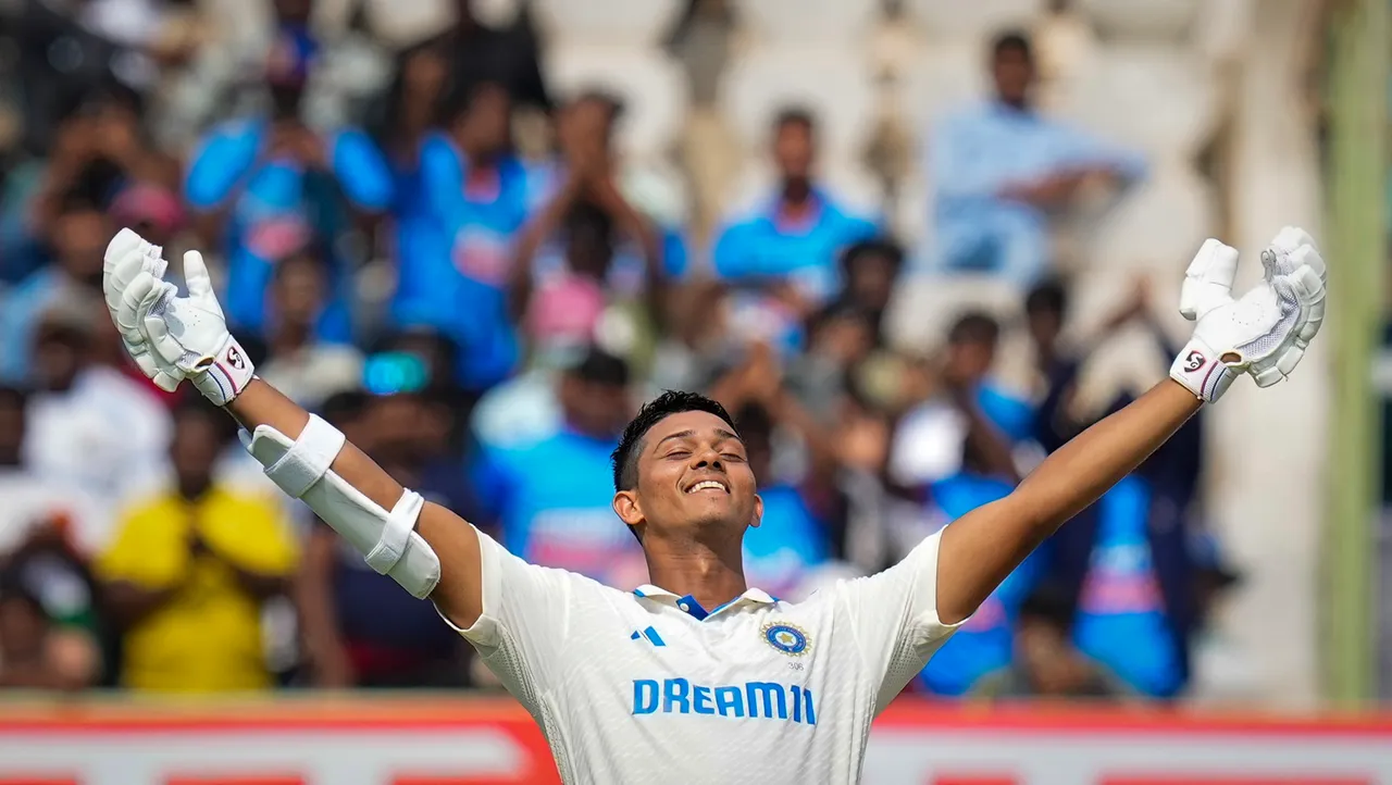 India's batter Yashasvi Jaiswal celebrates his century during the first day of the second Test cricket match between India and England