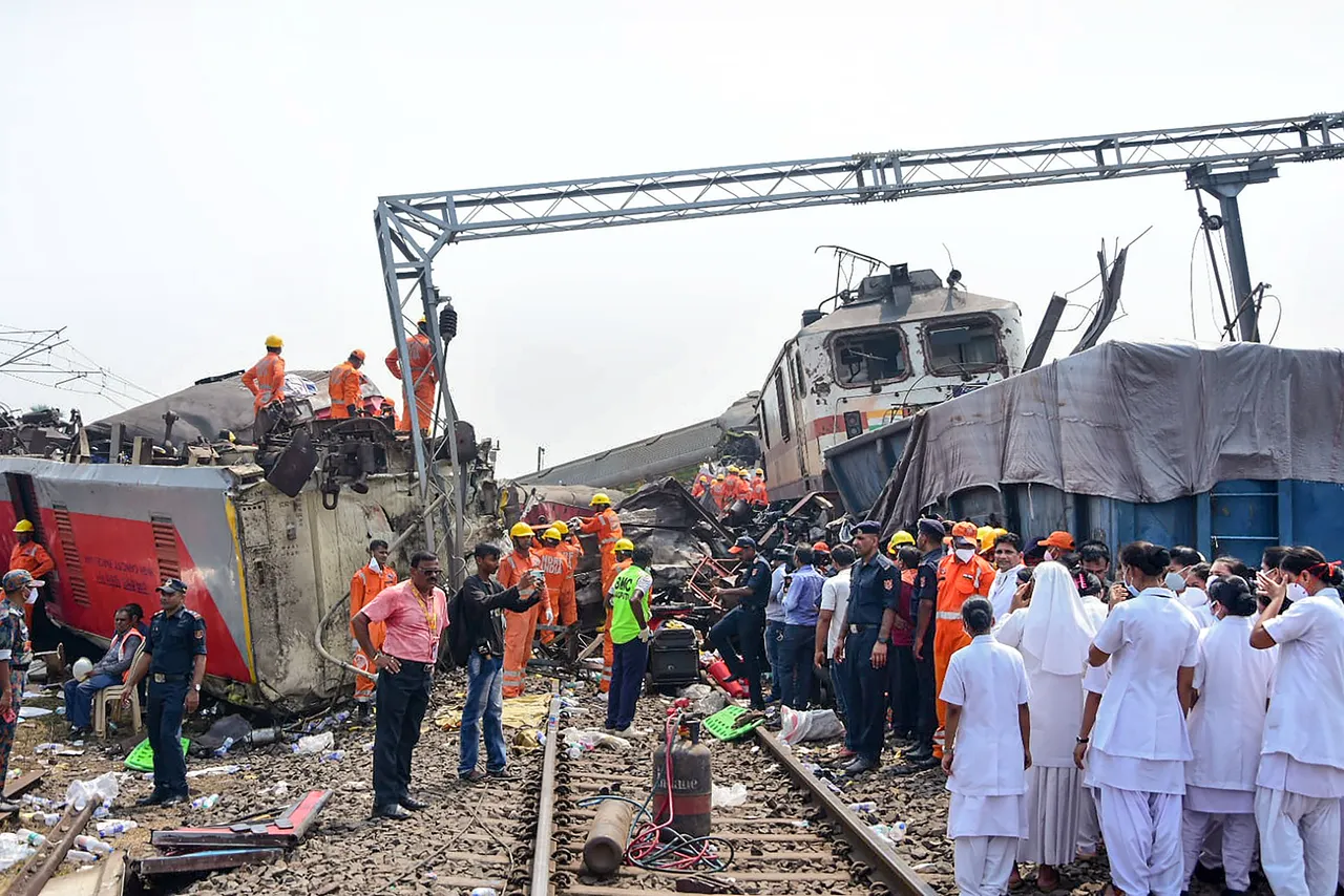 Rescue work underway after an accident involving Coromandel Express, Bengaluru-Howrah Express and a goods train