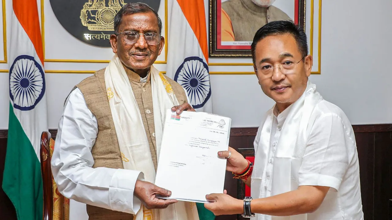 Sikkim Krantikari Morcha (SKM) leader Prem Singh Tamang meets State Governor Lakshman Prasad Acharya to stake claim to form the government in the state at Raj Bhavan, in Gangtok, Sikkim