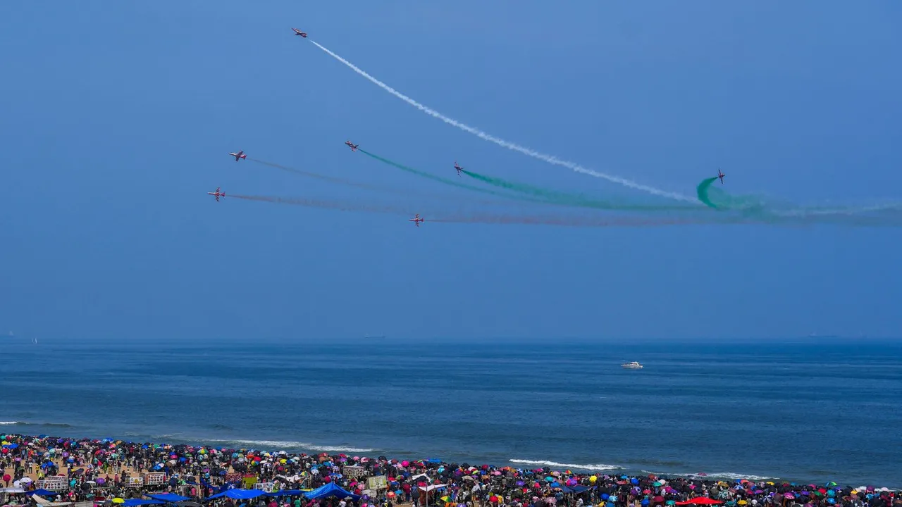Indian Air Force's (IAF) aerobatics team 'Surya Kiran' performs during an air show as part of the 92nd anniversary celebrations of IAF, at Marina Beach, in Chennai, Sunday, Oct. 6, 2024.