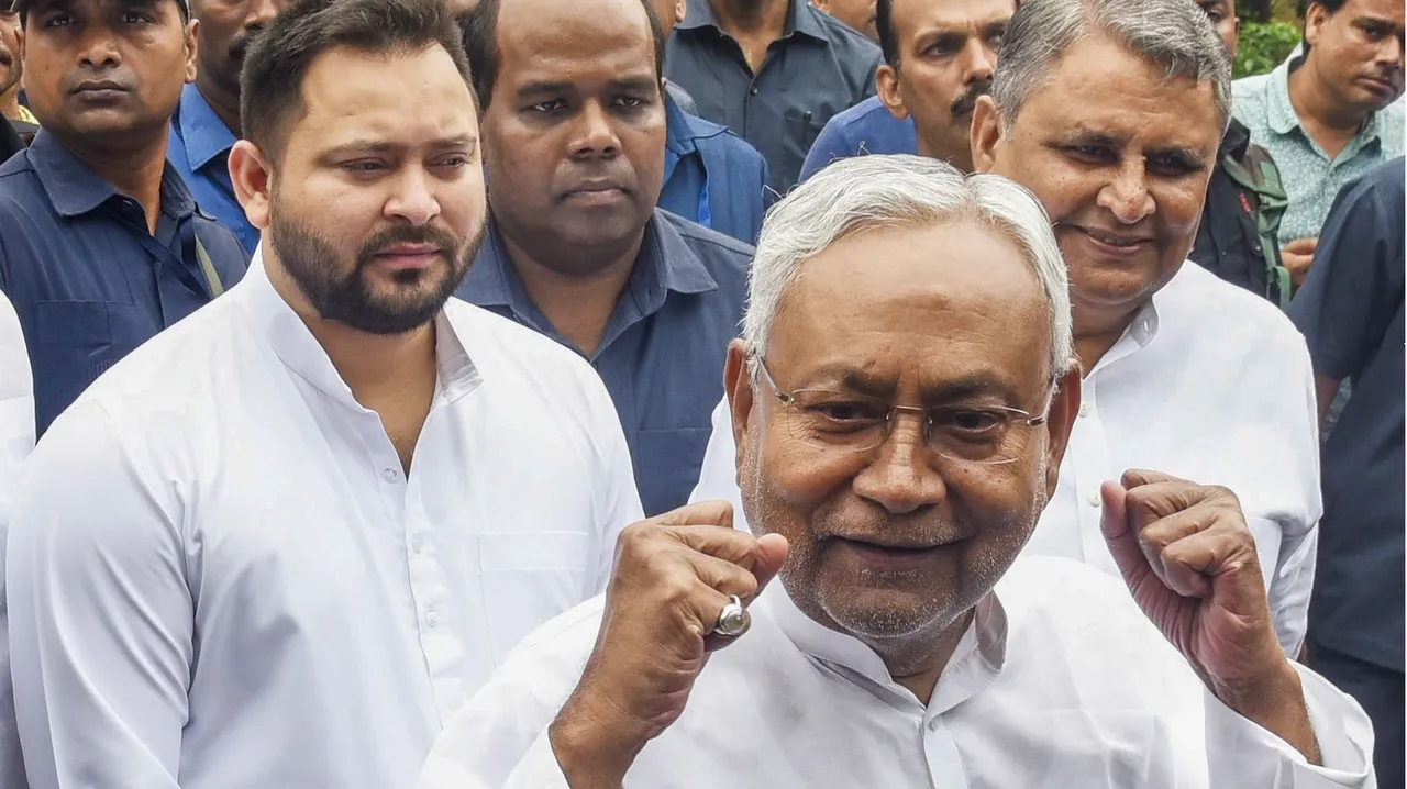 Bihar Chief Minister Nitish Kumar with Deputy Chief Minister Tejashwi Yadav during celebrations of the birth anniversary of Bharatiya Jana Sangh leader Deendayal Upadhyaya, in Patna