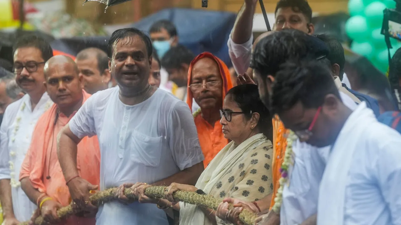 West Bengal Chief Minister Mamata Banerjee pulls ropes of the chariot during ISKCON Rath Yatra, in Kolkata, Sunday, July 7, 2024.