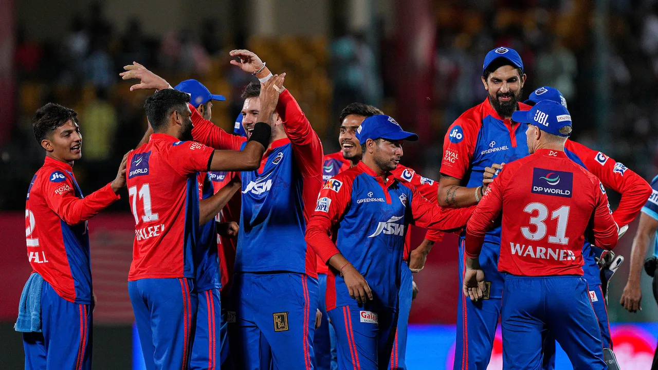 Delhi Capitals players celebrate the wicket of Punjab Kings batter Jitesh Sharma at HPCA Stadium in Dharamshala on May 17
