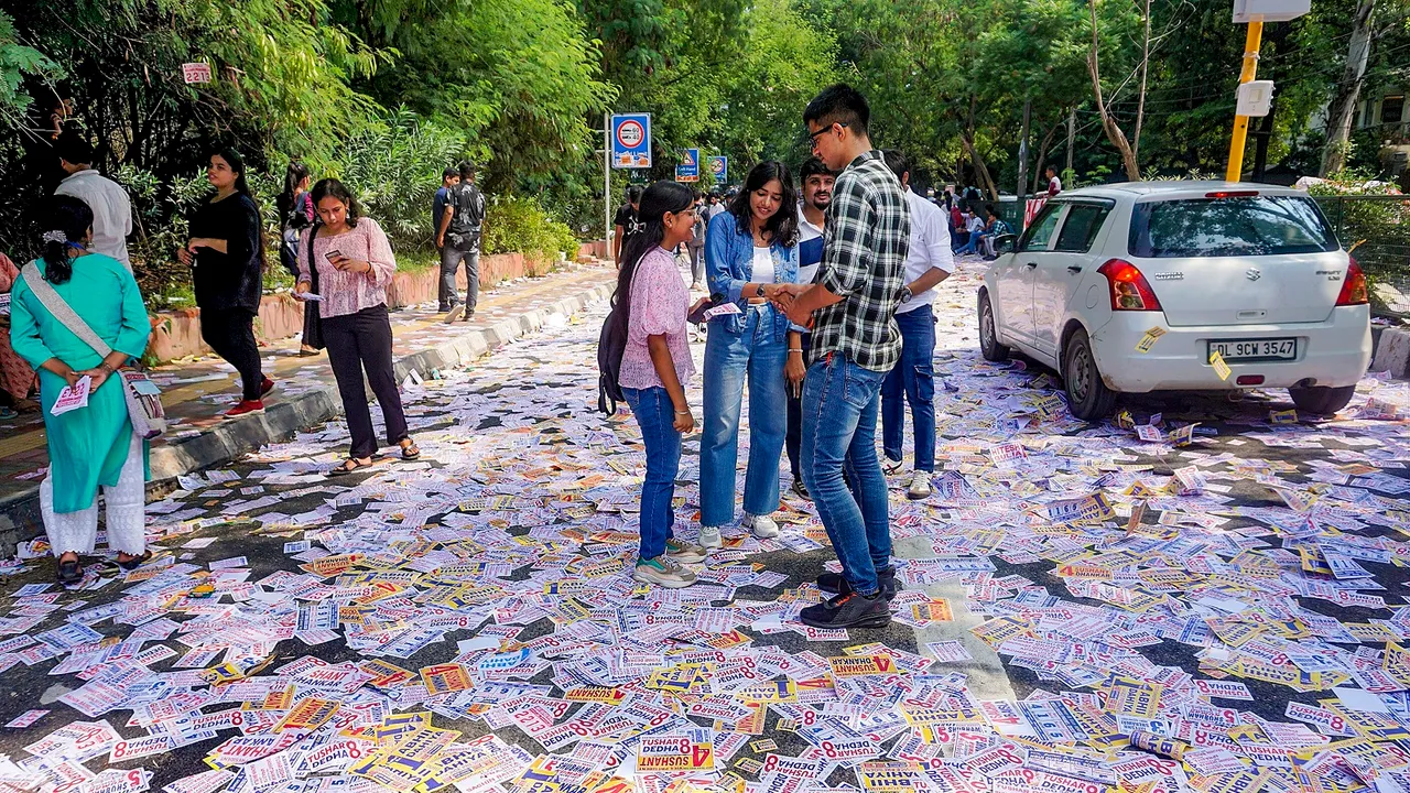 Students at the College Of Vocational Studies during Delhi University Students' Union (DUSU) polls, in New Delhi, Friday