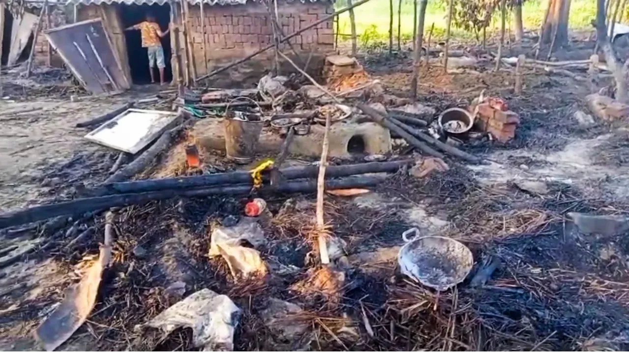 Charred remains are seen after multiple houses were allegedly set on fire, in Nawada district, Bihar, late Wednesday, Sept. 18, 2024.