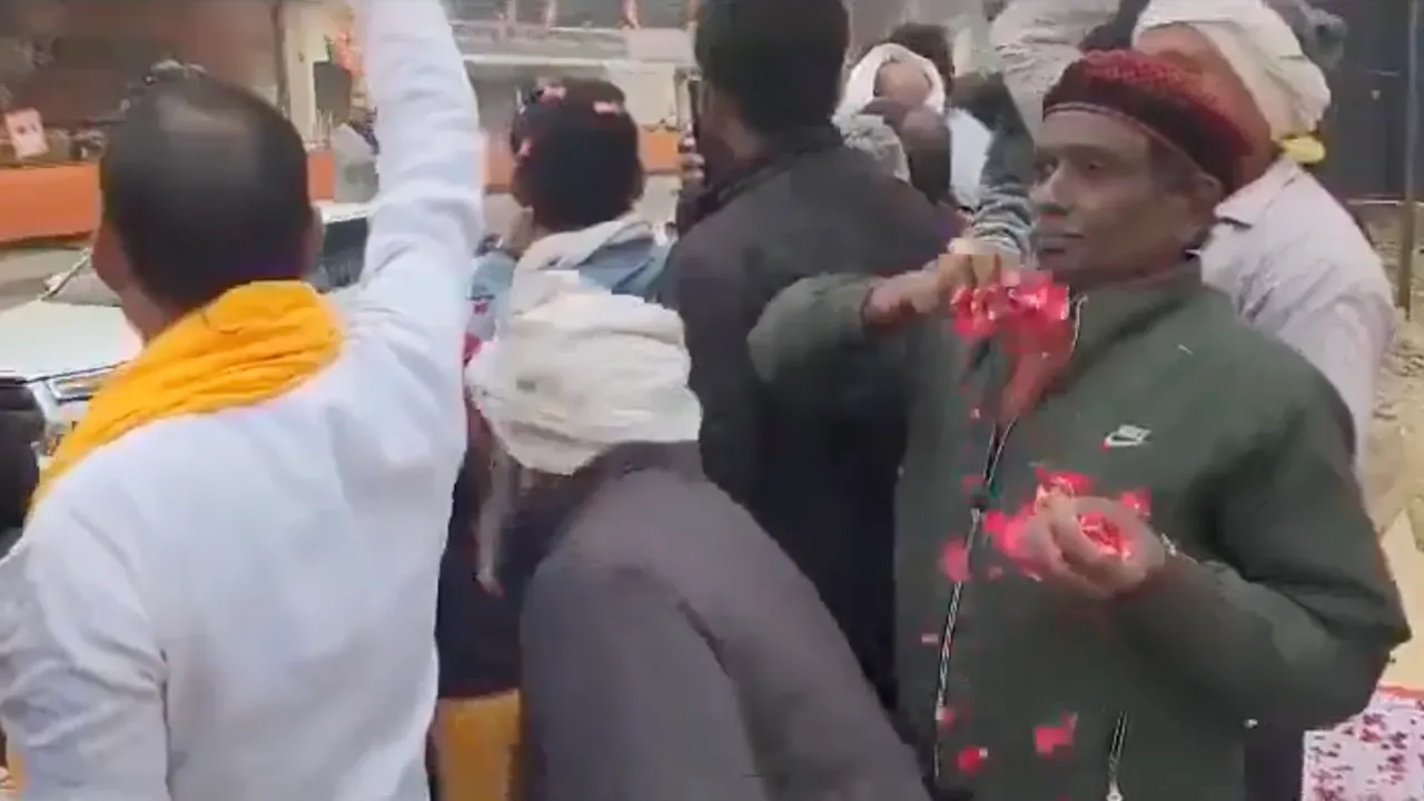 Iqbal Ansari showers flower petals on PM Modi's roadshow