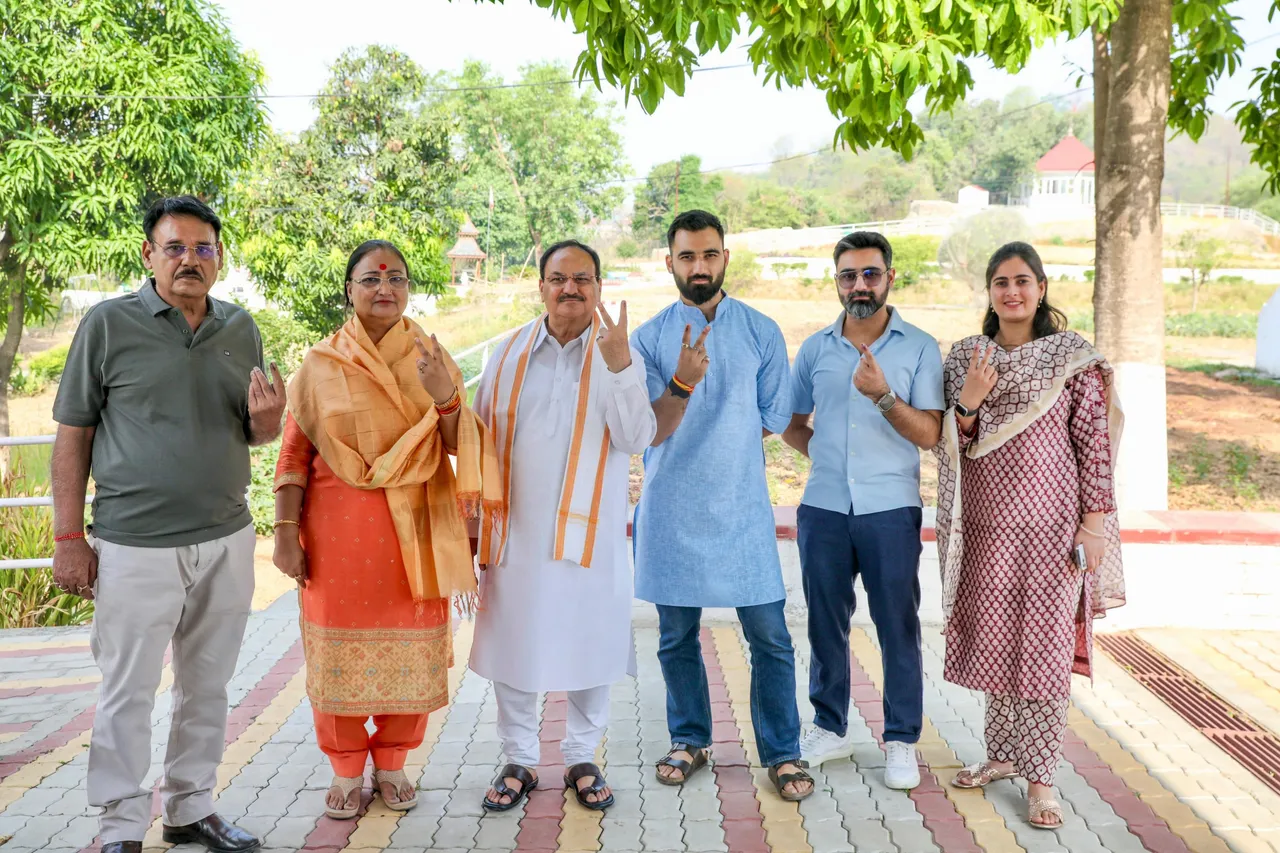 BJP president JP Nadda after voting with his family