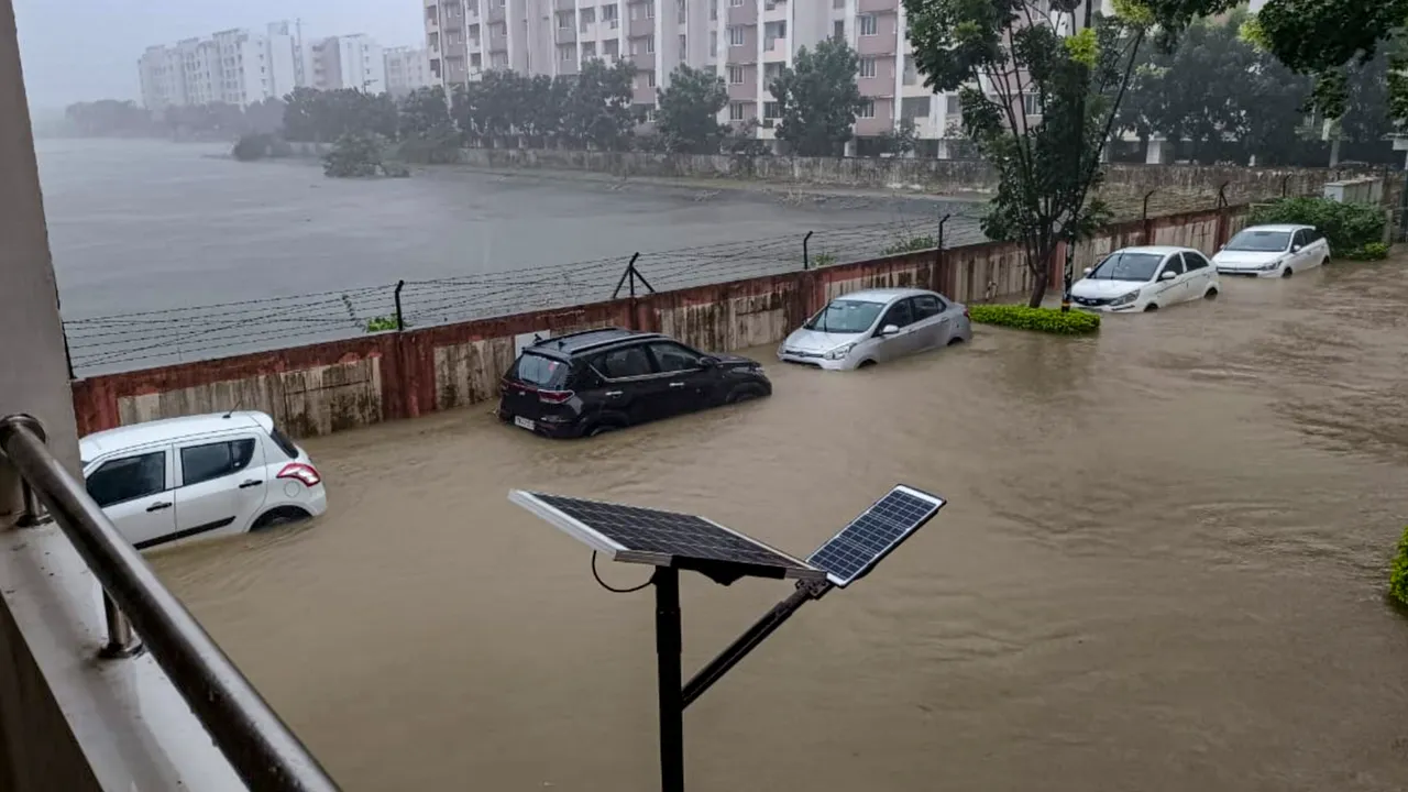 Vehicles stuck at a locality flooded due to heavy rain owing to Cyclone Michaung, in Chennai, Monday, Dec. 4, 2023.