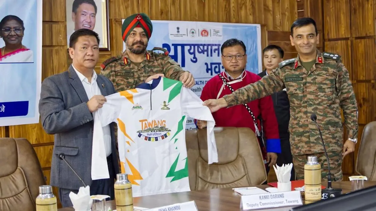 Arunachal Pradesh Chief Minister Pema Khandu displaying jersey for the Tawang Marathon