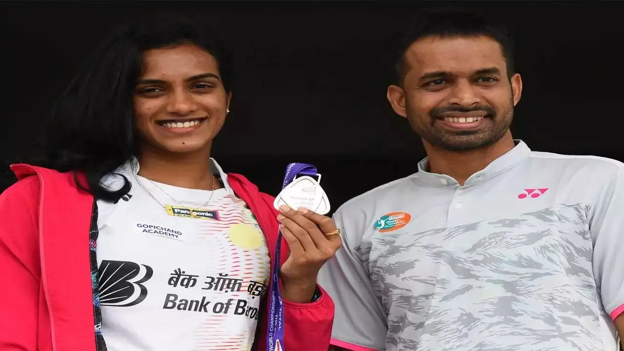PV Sindhu AND Pullela Gopichand.jpg